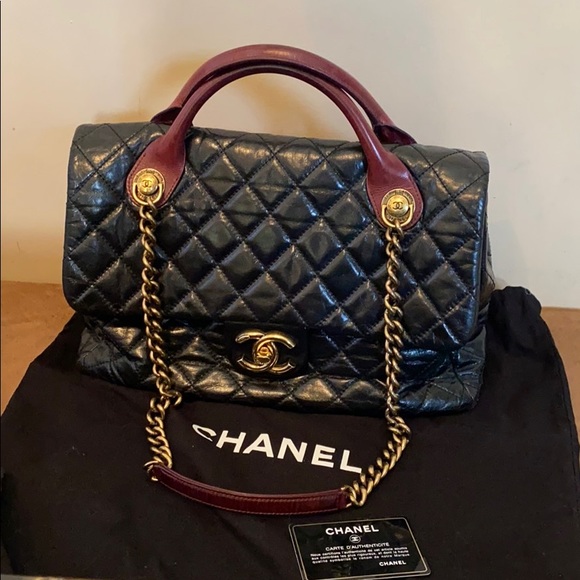 CHANEL Handbags - 💯% Authentic Chanel Castle Rock bag